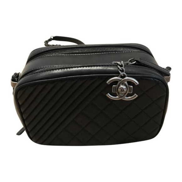 CHANEL Handbags - CHANEL Lambskin Small Coco Boy Camera Case Black